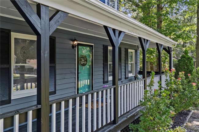 Doorway to property with covered porch | Image 6