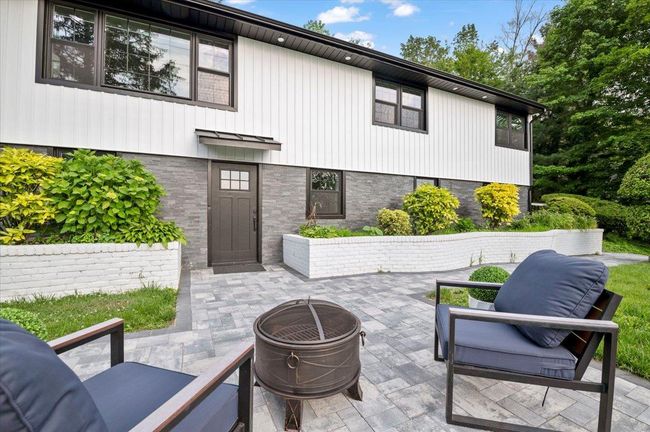 View of patio / terrace with a fire pit | Image 34