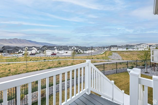 Wooden terrace with a mountain view and a residential view | Image 36