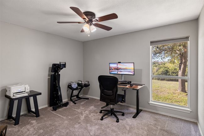 Office featuring baseboards, carpet flooring, and ceiling fan | Image 20