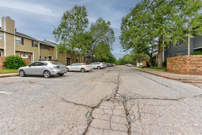 View of road with a residential view, sidewalks, and curbs | Image 16