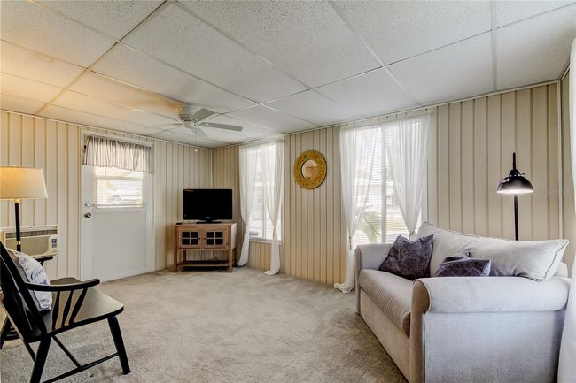 6. BONUS Room (9.9' x 15.5) is Currently a Family Room.. Use as YOU Wish.. Has a Window Unit AC for Extra Cooling Power! Opens to LR.. | Image 6