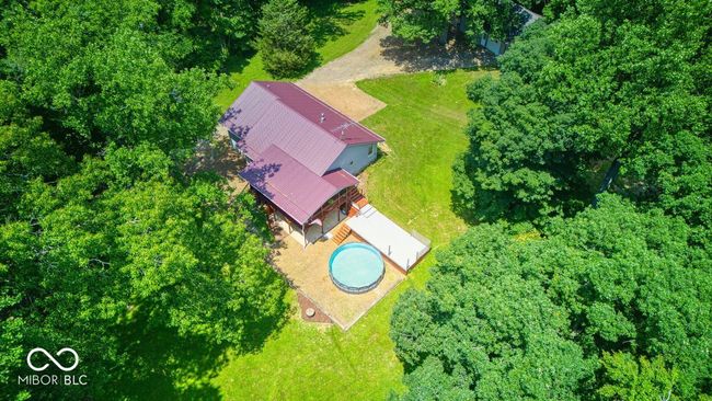 view from above of property featuring a pool area | Image 15