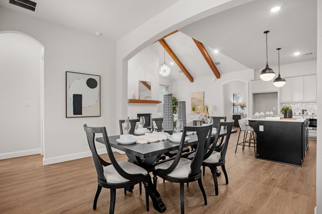 Beyond the arched doorway is another bedroom to the left and full bath to the right | Image 20