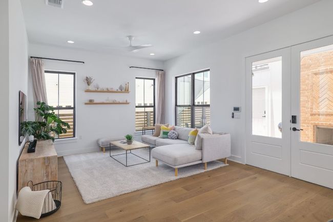 Open floor plan - view of the family room from the kitchen | Image 6