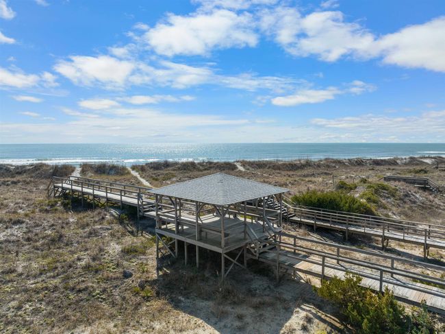 Exterior space with a water view and a view of the beach | Image 23