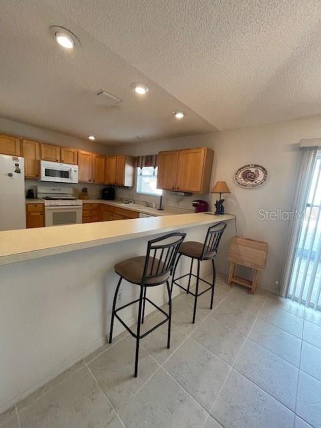 7620 Se 171st Horseshoe Lane, House other with 2 bedrooms, 2 bathrooms and null parking in The Villages FL | Image 11