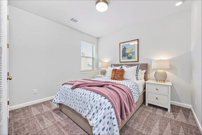 Bedroom with light carpet and baseboards. (Virtual Staging) | Image 23