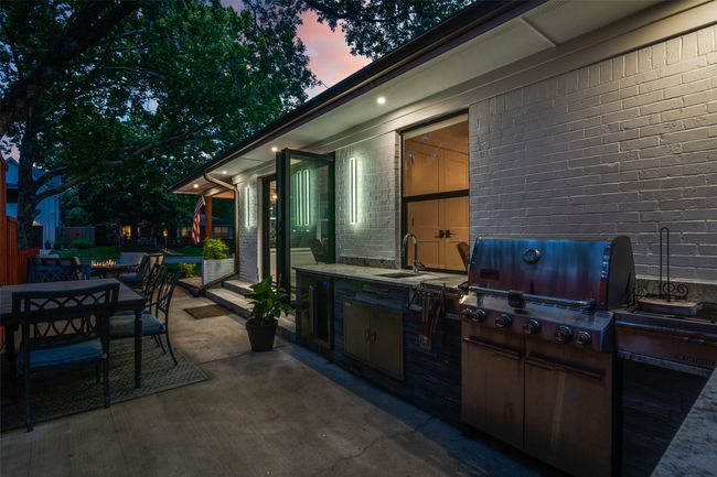 View of patio / terrace featuring outdoor dining space and area for grilling | Image 34