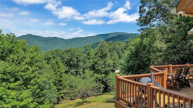 Experience the tranquil charm of the North Carolina countryside, with sweeping, long-range mountain views that promise a peaceful retreat amidst rustic beauty. | Image 9