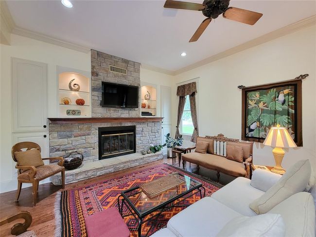 Expansive 22x32 living room, perfect for entertaining and relaxation. | Image 15