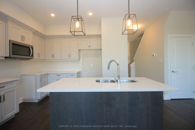 71 - 601 Lions Park Dr, House attached with 3 bedrooms, 4 bathrooms and 1 parking in Mount Brydges ON | Image 11