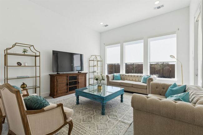 Living area featuring light colored carpet, recessed lighting, and baseboards | Image 14