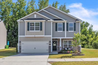 covered front porch-2 car garage | Image 3