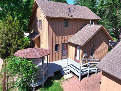 Back of house featuring a wooden deck | Image 2