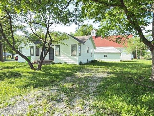 1300 E Park Ave, Rich Hill, MO, 64779-1327 | Card Image