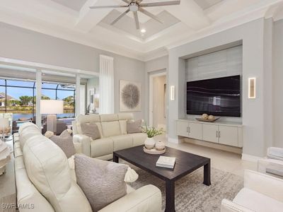 Furnished Living Room with high coiffured ceiling. | Image 2