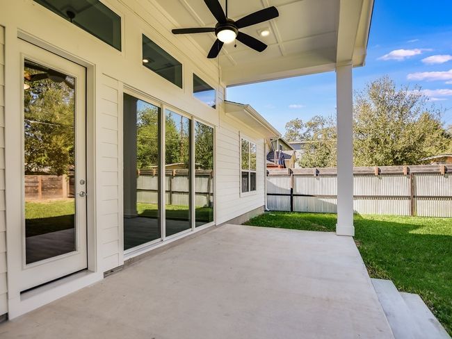 View of patio / terrace with a ceiling fan | Image 27