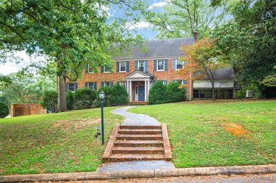 Brick front steps and random slate walkway to the front door. | Image 2