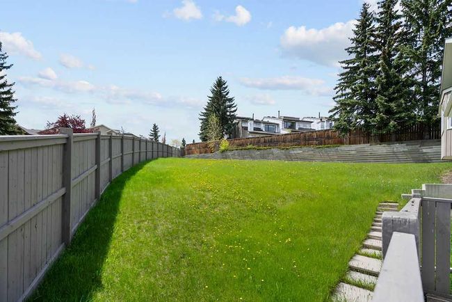 76 Coach Gate Way Sw, House other with 3 bedrooms, 2 bathrooms and 4 parking in Calgary AB | Image 36