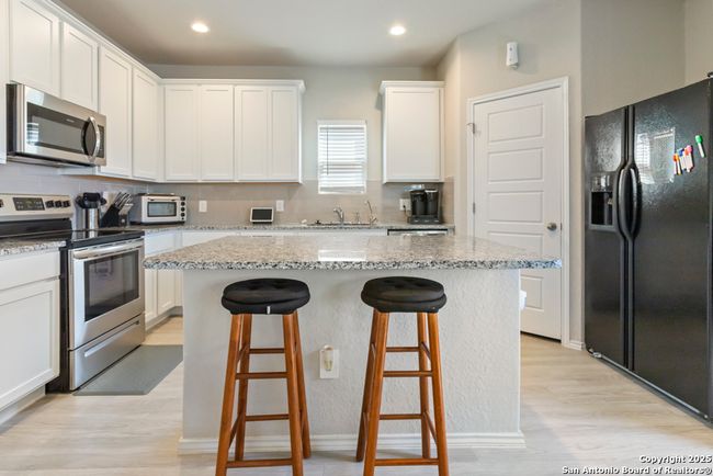 14550 Open Range Rd, House other with 4 bedrooms, 3 bathrooms and null parking in Lytle TX | Image 8