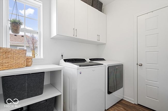 laundry room featuring custom cabinets | Image 26