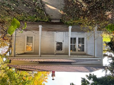 Bungalow-style home with a porch | Image 1