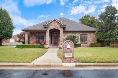 View of property featuring a front lawn | Image 1