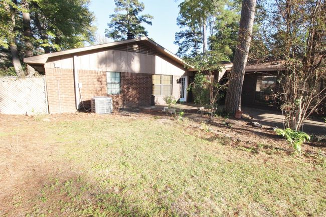 Great open patio and a spacious covered patio. | Image 29