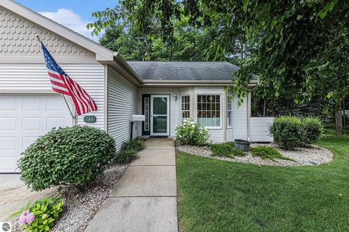 344 Golfview Ln, Elk Rapids, MI, 49629-9566 | Card Image