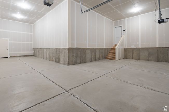 Garage featuring a garage door opener | Image 22