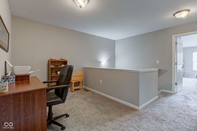 carpeted loft office | Image 17