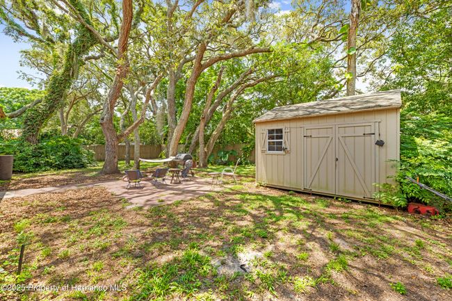 8268 Garrison St, House other with 3 bedrooms, 3 bathrooms and null parking in Spring Hill FL | Image 50