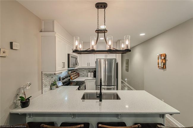 8 - 992 Windham Lane, House attached with 2 bedrooms, 1 bathrooms and 2 parking in Windham Centre ON | Image 10