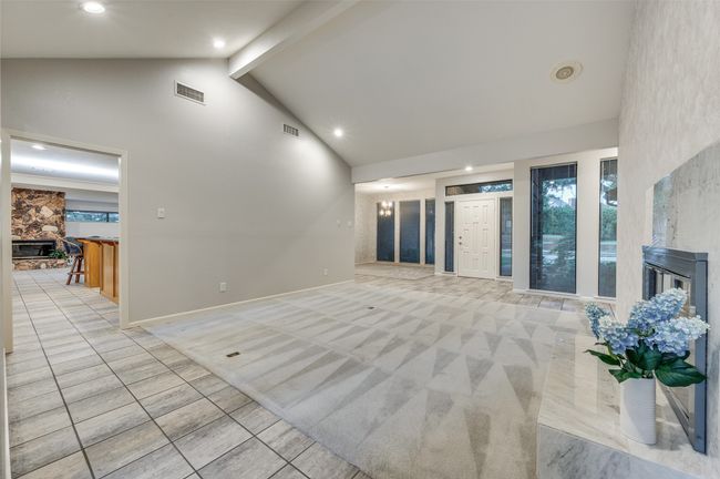 Living and dining rooms open to each other for easy entertaining | Image 9