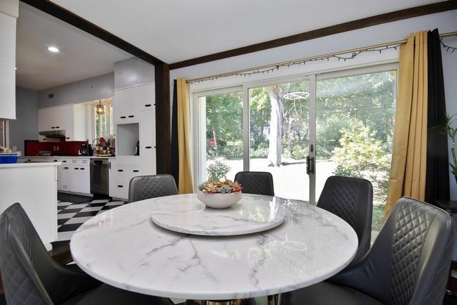Kitchen has SGD to covered patio | Image 5