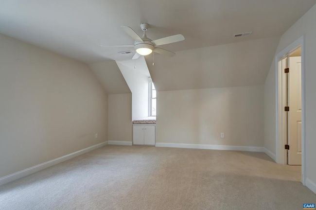Bedroom 2 with dormer window/reading nook, large walk-in closet and private bathroom. | Image 41