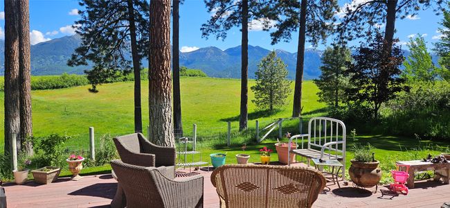 View of patio / terrace featuring a deck with mountain view | Image 57