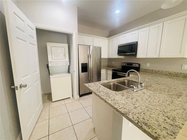 1589 Cumin Dr, Home with 2 bedrooms, 2 bathrooms and null parking in POINCIANA FL | Image 12