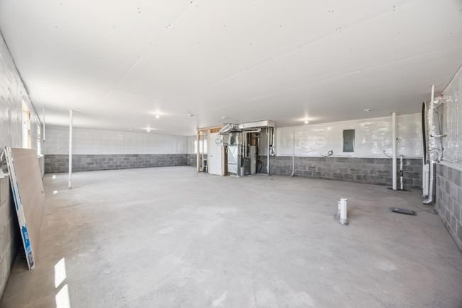 The unfinished lower level awaits your finishing touches! | Image 20
