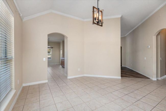 Another view of the dining room looking into the Kitchen | Image 8