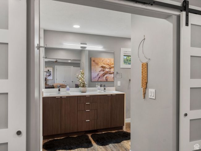Full bathroom with double vanity, wood finished floors, and recessed lighting | Image 20
