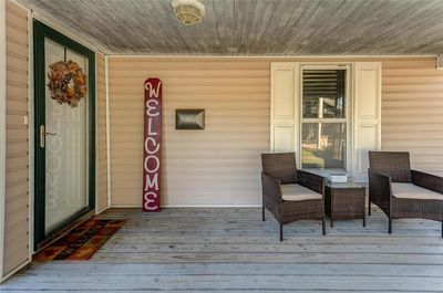 Morning coffee is so lovely on the front porch. There's even room for a swing! | Image 3