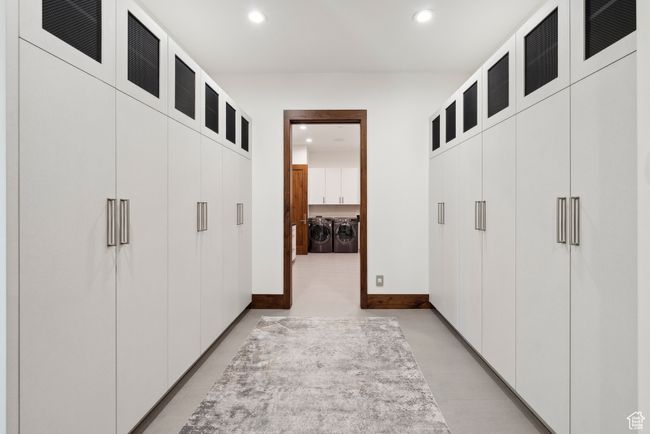 Hall featuring washing machine and dryer, recessed lighting, and baseboards | Image 38