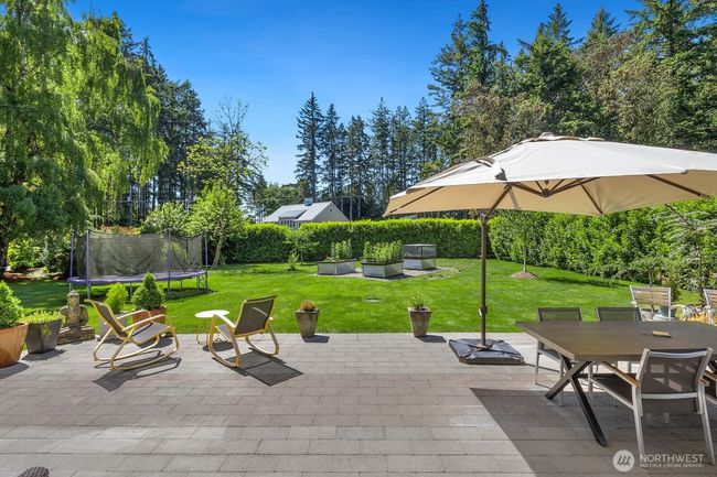 Mature plantings in the yard create your own private retreat | Image 29