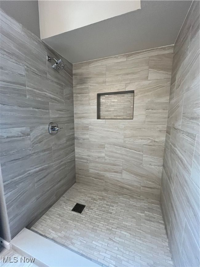 Full bath with tiled shower | Image 29