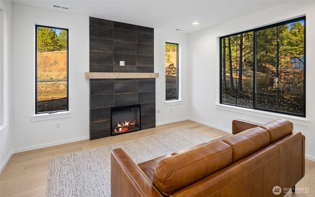As the newest PNW master-planned community, enjoy 200+ acres of open space, trails & the Coal Trax Mt Bike Park. Soaring ceilings in the great roommake each day worthy of celebration & open floorplan appeals to entertaining. Covered deck & patio. Southern-facing homesites range from the mid600s- 900ks. Enjoy a variety of innovative & distinctive new home options with the best all-season recreation just moments away! Built for the future, indulge in a retreat just 90-min to Seattle. Plans and elevations are artist’s renderings only, may not accurately represent the actual condition of a home asconstructed and may also contain options and upgrades which are not included in the sale. Trailside Homes reserves the right to make changes to the floorplan, specifications, dimensions, design and elevations without prior notice. Stated dimensions and square footage are estimated and should not be usedas representations of the home’s actual size. | Image 22