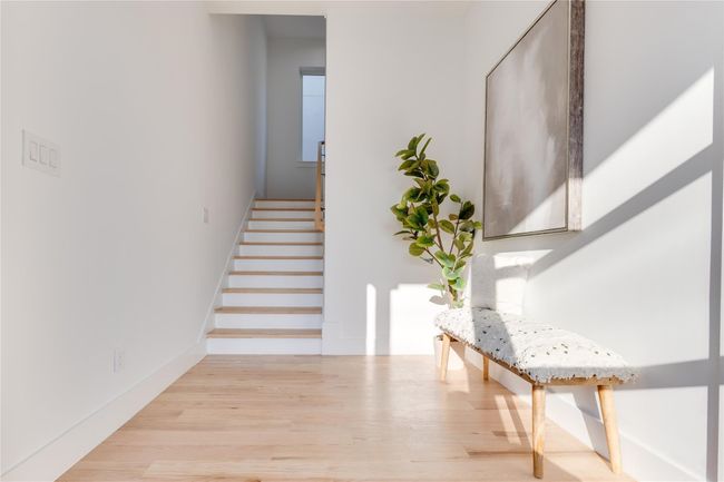 Staircase with hardwood / wood-style flooring | Image 30