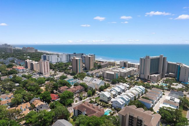 View of urban area featuring a large body of water | Image 30