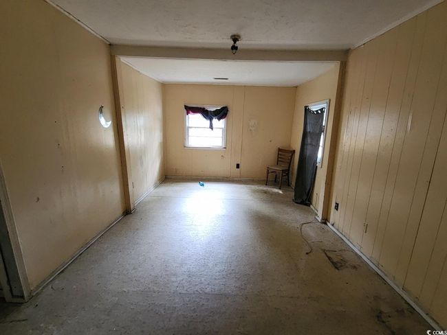 Empty room with wood walls | Image 8